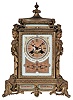 Japy Freres, also stamped, D.C. & Cie, Paris, France, decorative mantel clock, 8 days, time and bell strike, spring driven movement with maker's stamp in a brass case with decorative brightly painted porcelain panels featuring Moorish motif and matching insets and dial and pendulum regulation through the dial above 12.