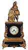 Japy Freres, Paris, France, figural mantel clock, 8 days, time and strike, spring driven movement in a slate and brass topped and banded case with additional brass trim and surmounted by troubadour cradling his lyre with cream enamel dial.