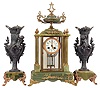 France, Crystal Regulator with green onyx and brass case. 8 day time and strike Japy Freres Medaille D'Honneur movement with rack & snail half hour striking, two matching onyx and bronze garniture figural urns.