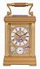 France, for Theodore B. Starr, New York, a large, decorative carriage clock with polychrome enamel decoration and grand sonnerie striking, the Anglaise variant case set with beveled glasses and gilt, porcelain panels, each decorated with flying and perching birds among flowering vines and branches, the dial with Roman numeral white enamel chapter, on a decorative panel matching the case sides, blued steel distaff hands, 8 day time, strike, and alarm movement with lever platform, sounding grand or petit quarters in passing, and repeating the last hour and quarter on demand, serial #1330