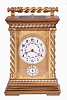 France, a large and unusual hour repeating carriage clock, the glazed, gilt case with stepped base, corners with twisted, beaded columns, the top with carrying handle of the same design as the columns, smaller twist and bead silvered bands above base and below cornice, Arabic numeral white enamel dials decorated with floral garlands and with double gilt mask, the outer portion fretted and engraved, the inner matted, gold fleur de lis hands, 8 day time, strike, and alarm movement with lever platform and cut bimetallic balance, serial #133