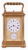 Drocourt, Paris, for Hamann & Koch, New York, an impressive, Gorge cased, grand sonnerie striking giant carriage clock, the massive gilt case with bevelled glasses, the top glass with engine turned mask with an oval aperture for viewing the escapement, Roman numeral white enamel dial also with gilt, engine turned mask, blued steel spade hands, 8 day time, strike, and alarm movement with large lever platform and cut, bimetallic balance, sounding grand or petit quarters in passing, and repeating the last hour and quarter on demand, the front plate marked 