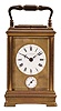 France for Bailey, Banks & Biddle, Philadelphia, Penn., carriage clock, 8 day, time and petite sonnerie with alarm, lever escapement, repeat button sounding the last hour and quarter, all in a gilt brass case with beveled front, side, back, and top glasses, white enamel dials.