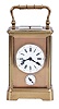 France, a petite sonnerie striking carriage clock with grand sonnerie repeating, polished brass Corniche case with bevelled glasses, the top engraved 