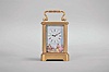 France, a mignonette No.1 carriage clock, glazed, gilt Corniche case, roman numeral, polychrome enamel dial depicting a young couple in a landscape, fancy gilt hands, 8 day, timepiece movement with lever platform, the back plate marked 