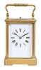 France, an unusual, five minute repeating carriage clock with single gong, gilt Corniche case with beveled glasses, Roman numeral white enamel dial, blued steel distaff hands, 8 day, time and strike movement with lever platform, counting the hours in passing, repeating the last hour when activated by top pusher, and repeating the last five minute interval through the pusher at case back