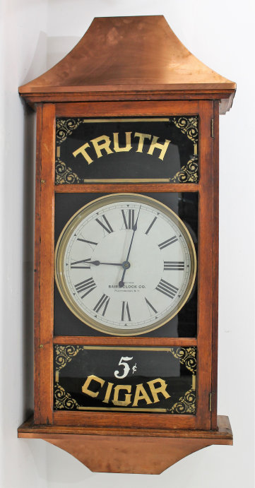 Antique Baird two-sided cigar advertiser Clock