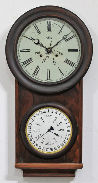 Antique Carter weight-driven calendar Clock