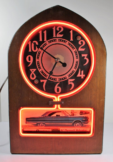 Antique Electric Ad Clock Revolving Glow Clock — Antique Clocks Price Guide