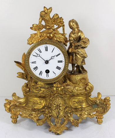 Antique French figural brass Clock — Antique Clocks Price Guide