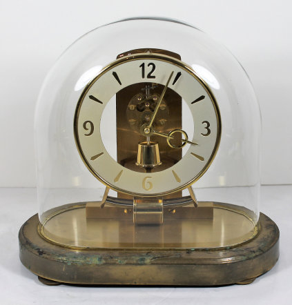 Antique Kundo electromagnetic under dome Clock — Antique Clocks Price Guide