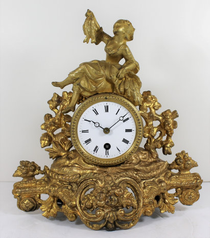 Antique Marti figural brass Clock — Antique Clocks Price Guide