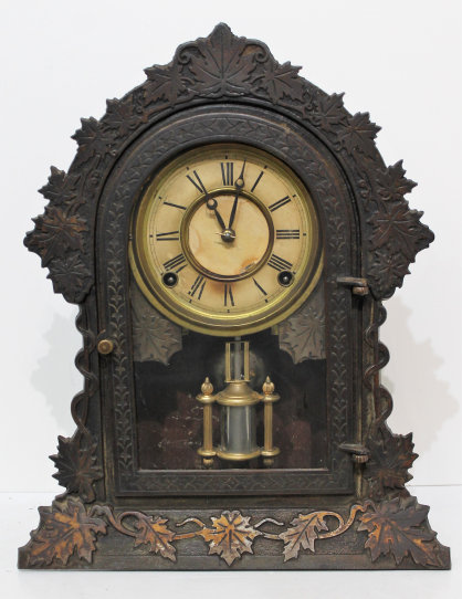 Antique Muller Sensation iron case Clock — Antique Clocks Price Guide