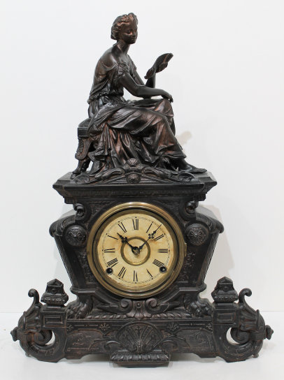 Antique Waterbury Romance figural Clock — Antique Clocks Price Guide