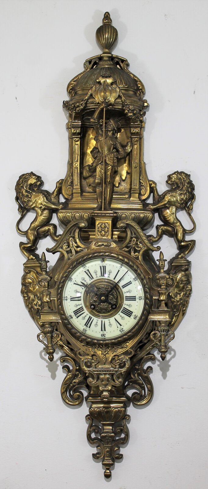 Antique Mougin brass cartel Clock — Antique Clocks Price Guide