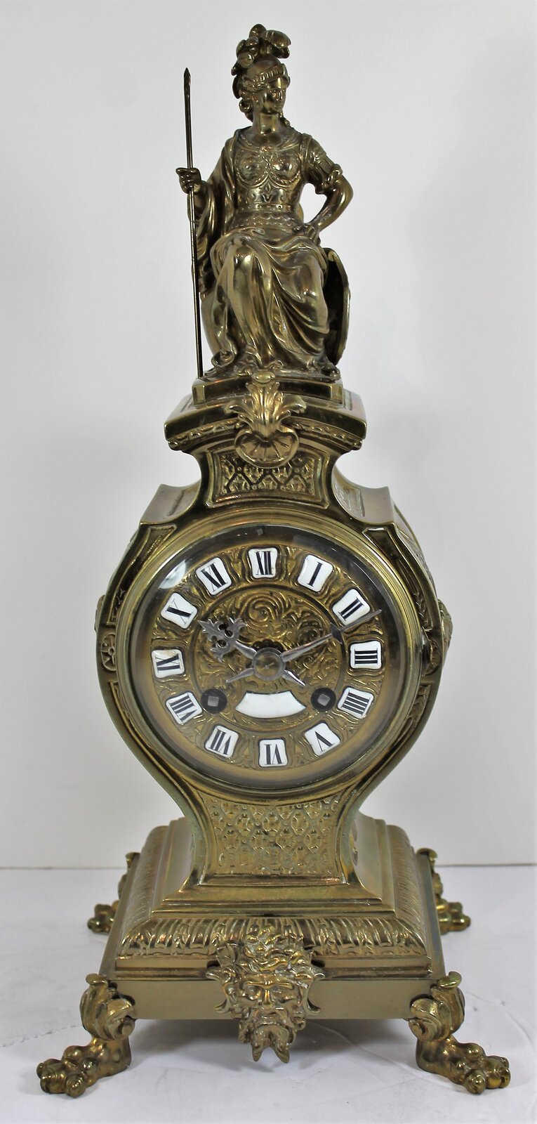 Antique Marti figural brass Clock — Antique Clocks Price Guide