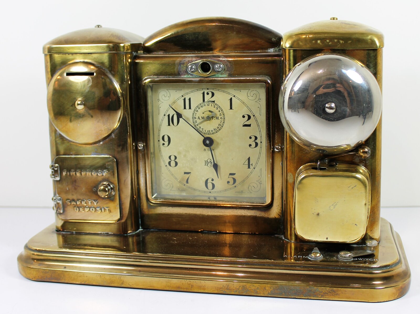 Antique Darche Flash light alarm brass finish Clock — Antique Clocks Price Guide