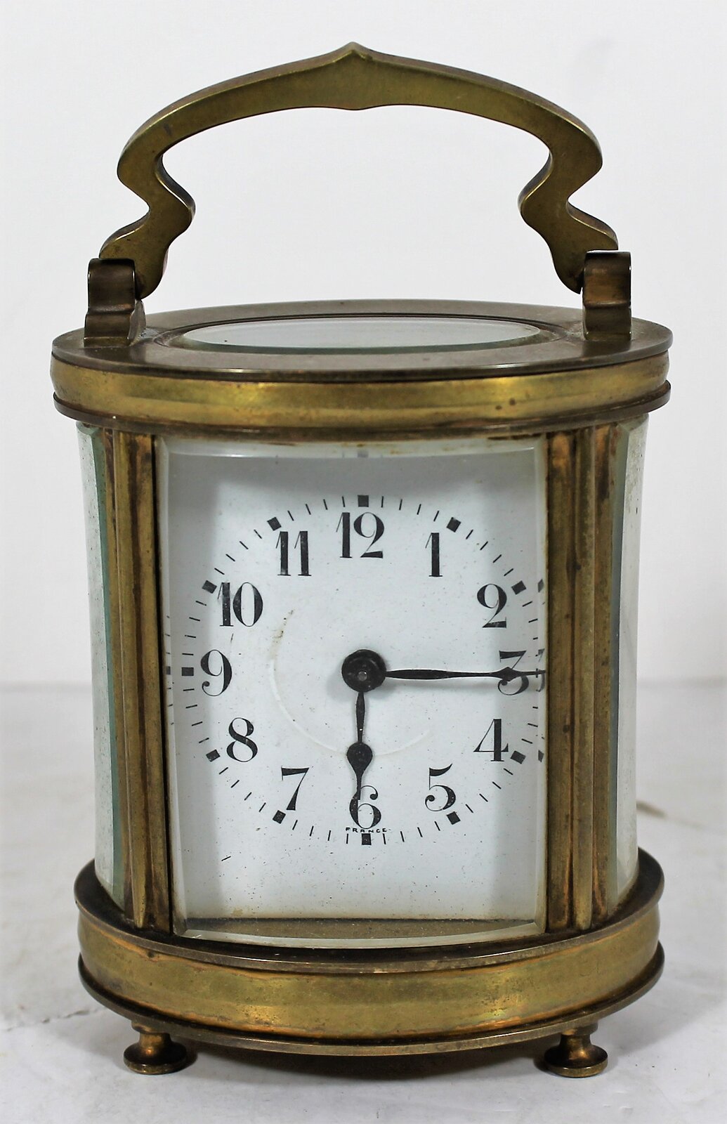 Antique Hour oval carriage Clock — Antique Clocks Price Guide