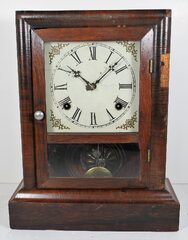 Antique Gilbert Coupon Clock