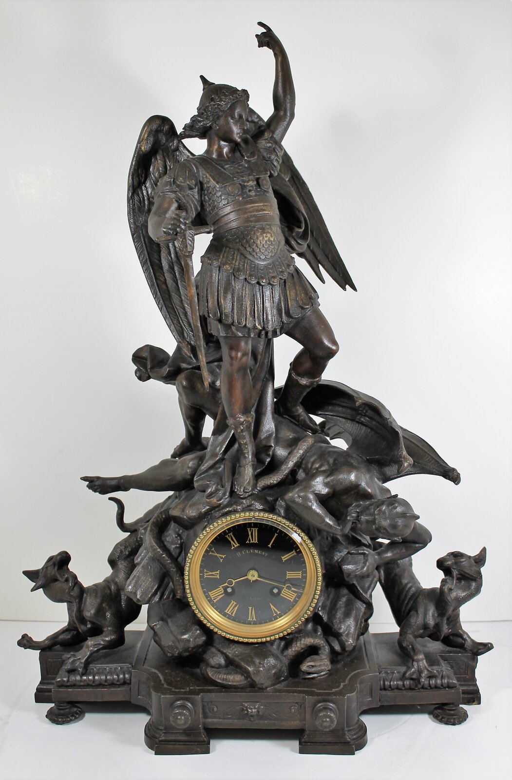 Antique French St Michael Archangel figural Clock — Antique Clocks Price Guide