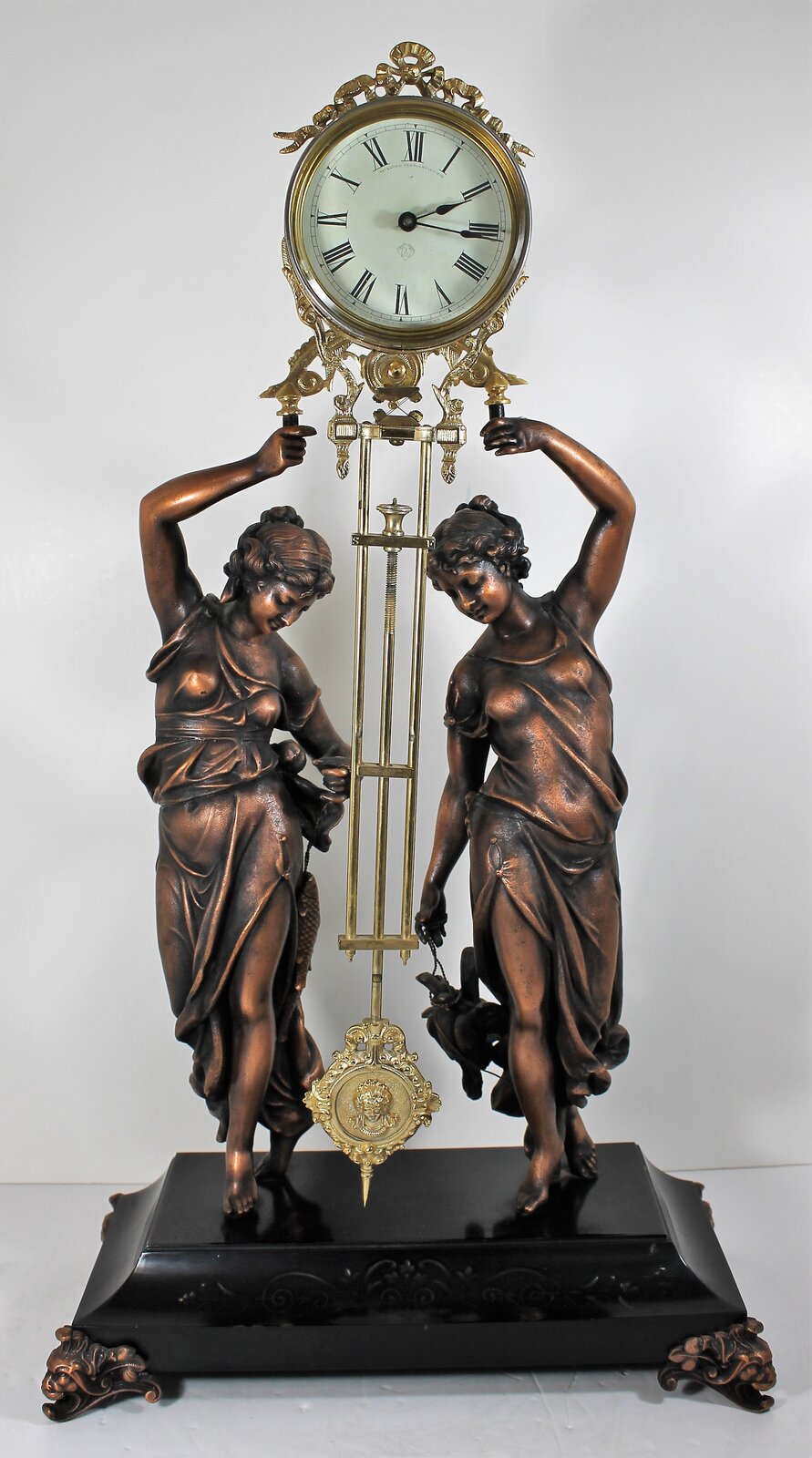 Antique Ansonia Double figure swing Clock — Antique Clocks Price Guide