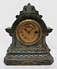 Antique Root iron case mantel Clock