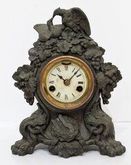 Antique Muller Dove iron case Clock