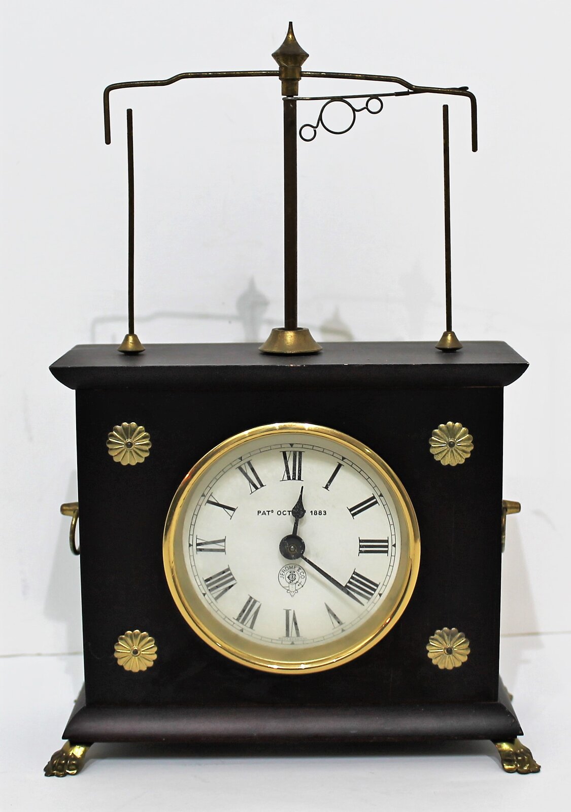 Horolovar Clock Co. “Flying Pendulum Clock”, ca. 1970. — Antique Clocks Price Guide