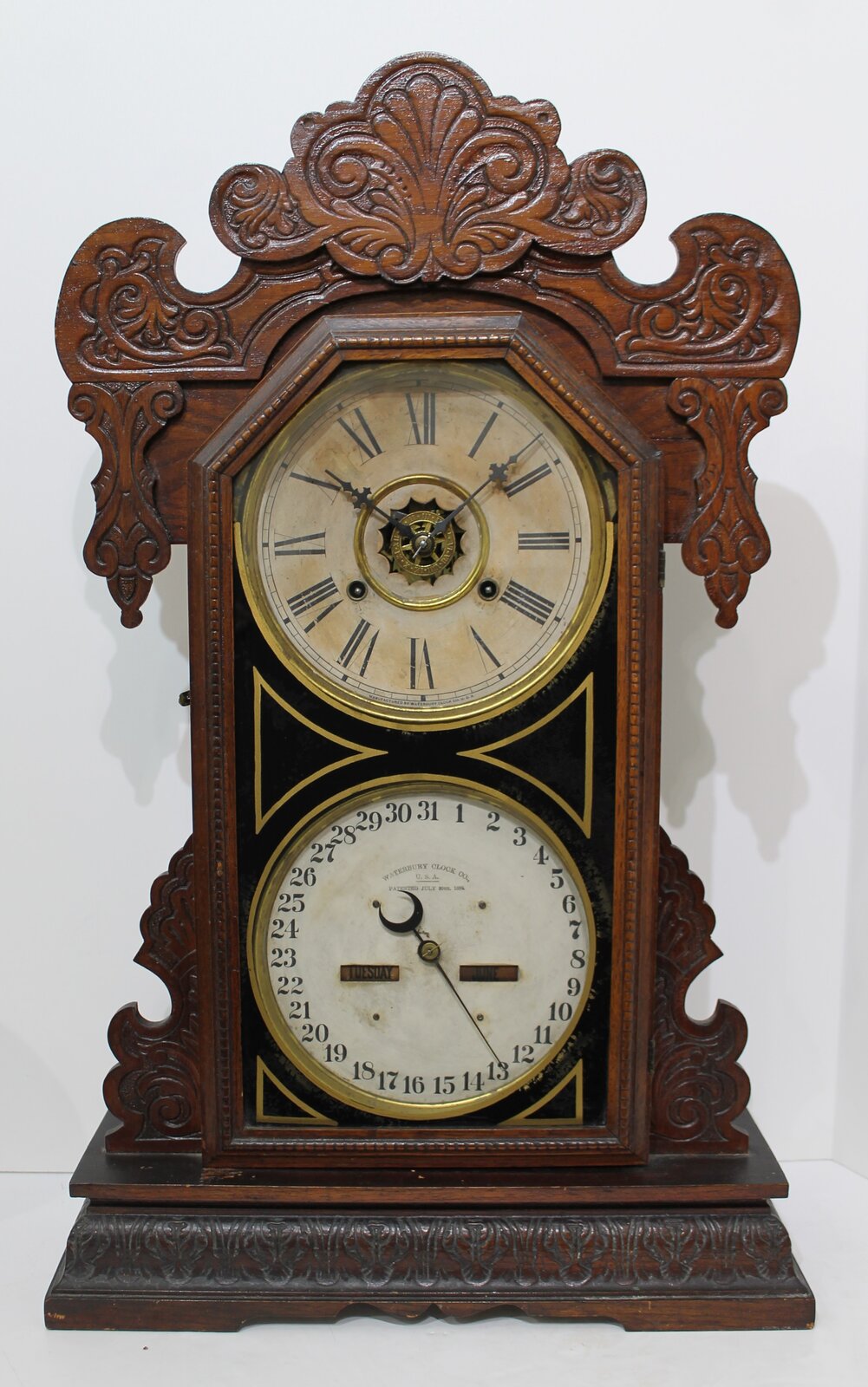 Waterbury Clock Co. “Oswego Calendar”, ca. 1900. — Antique Clocks Price Guide