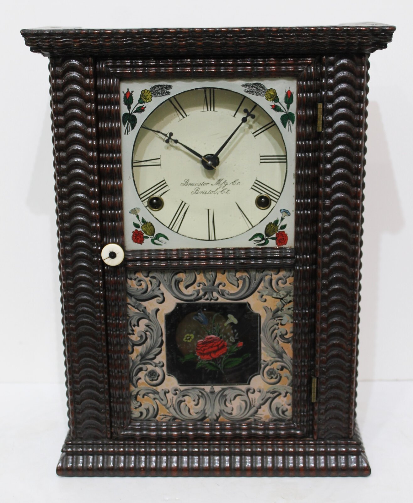 Brewster Mfg. Co. ripple-front cottage, 1852-1854. — Antique Clocks Price Guide