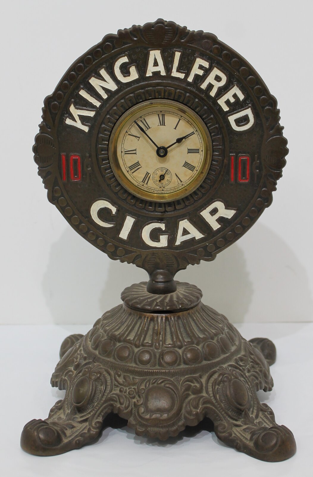King Alfred Cigar Cutter clock, ca. 1910. — Antique Clocks Price Guide