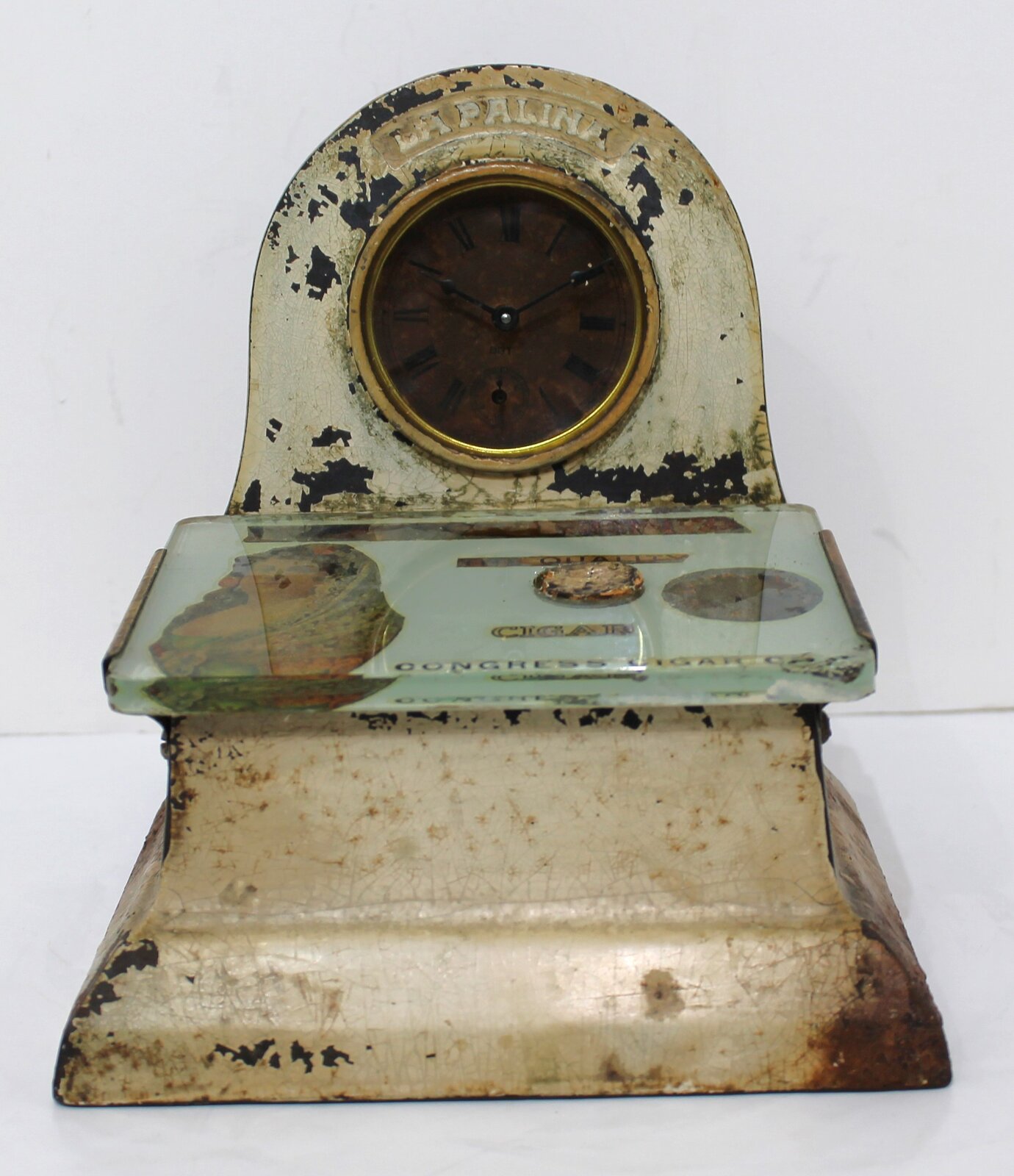 La Palina Cigar Cutter clock, ca. 1910. — Antique Clocks Price Guide