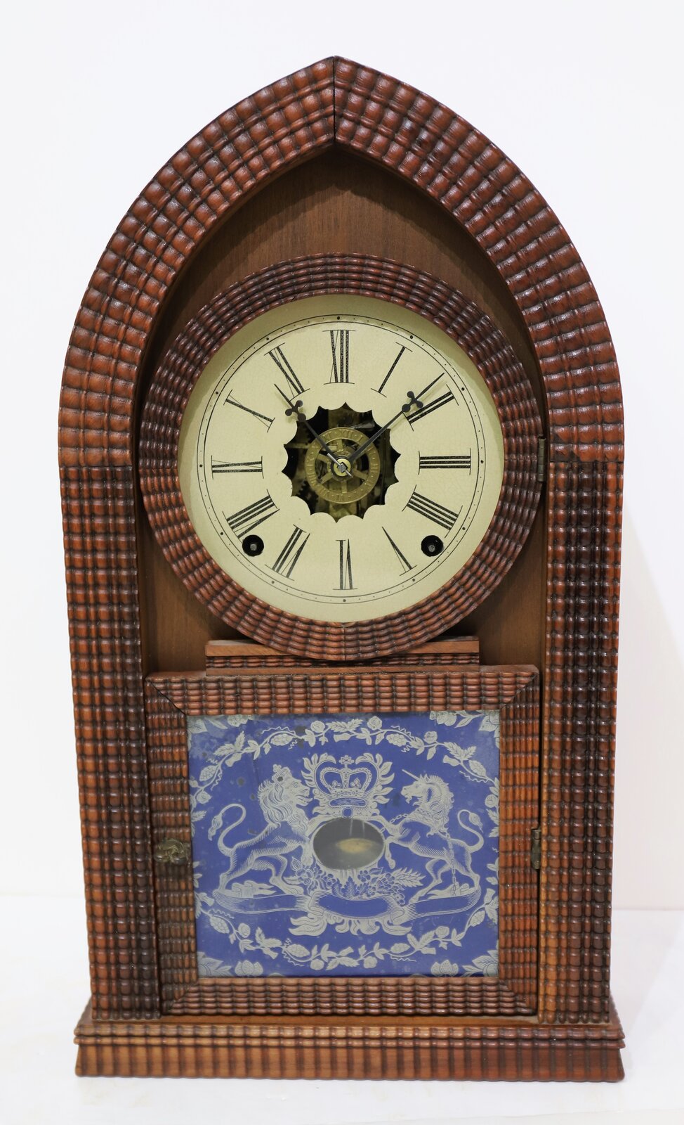 E.N. Welch Clock Co. ripple-front round gothic (beehive), ca. 1858. — Antique Clocks Price Guide