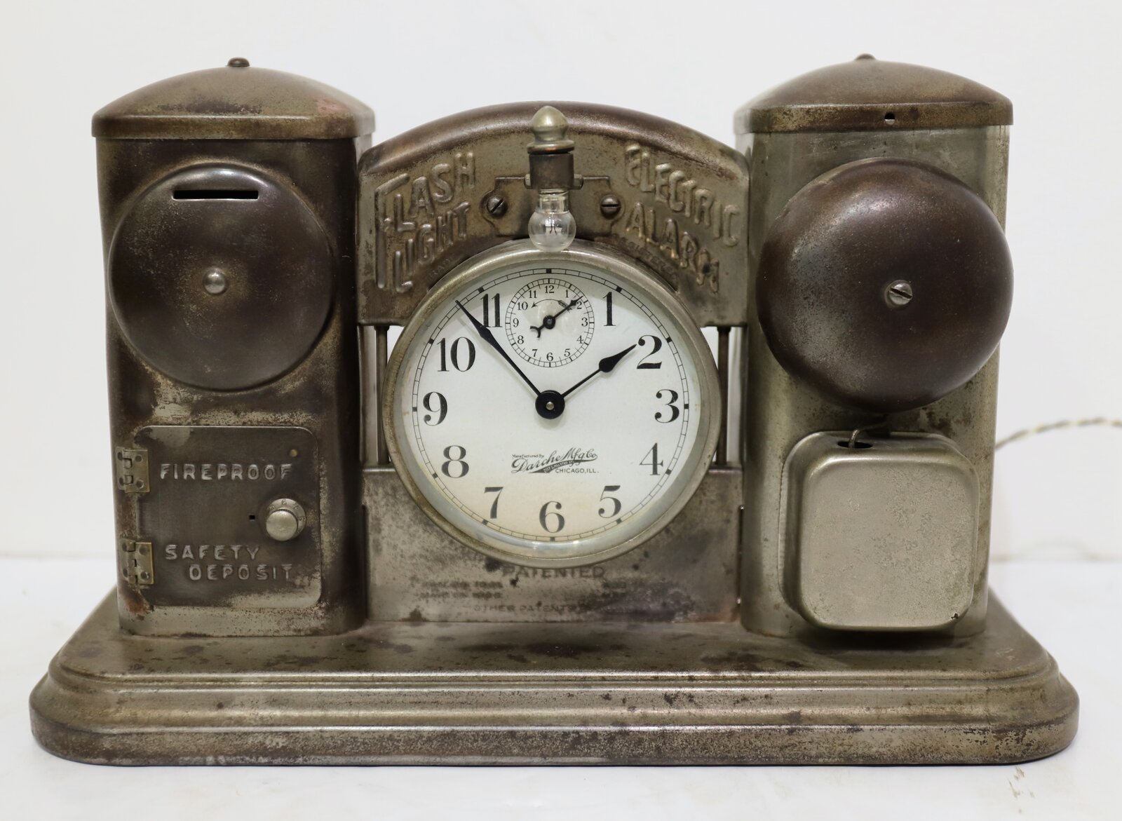 Darche Mfg. Co. “Flash Light Electric Alarm, Bank, and Call Clock”, ca. 1910. — Antique Clocks Price Guide