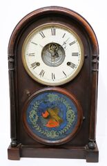 E.C. Brewster & Co. patented round top with J. Ives tin plate movement, 1861.