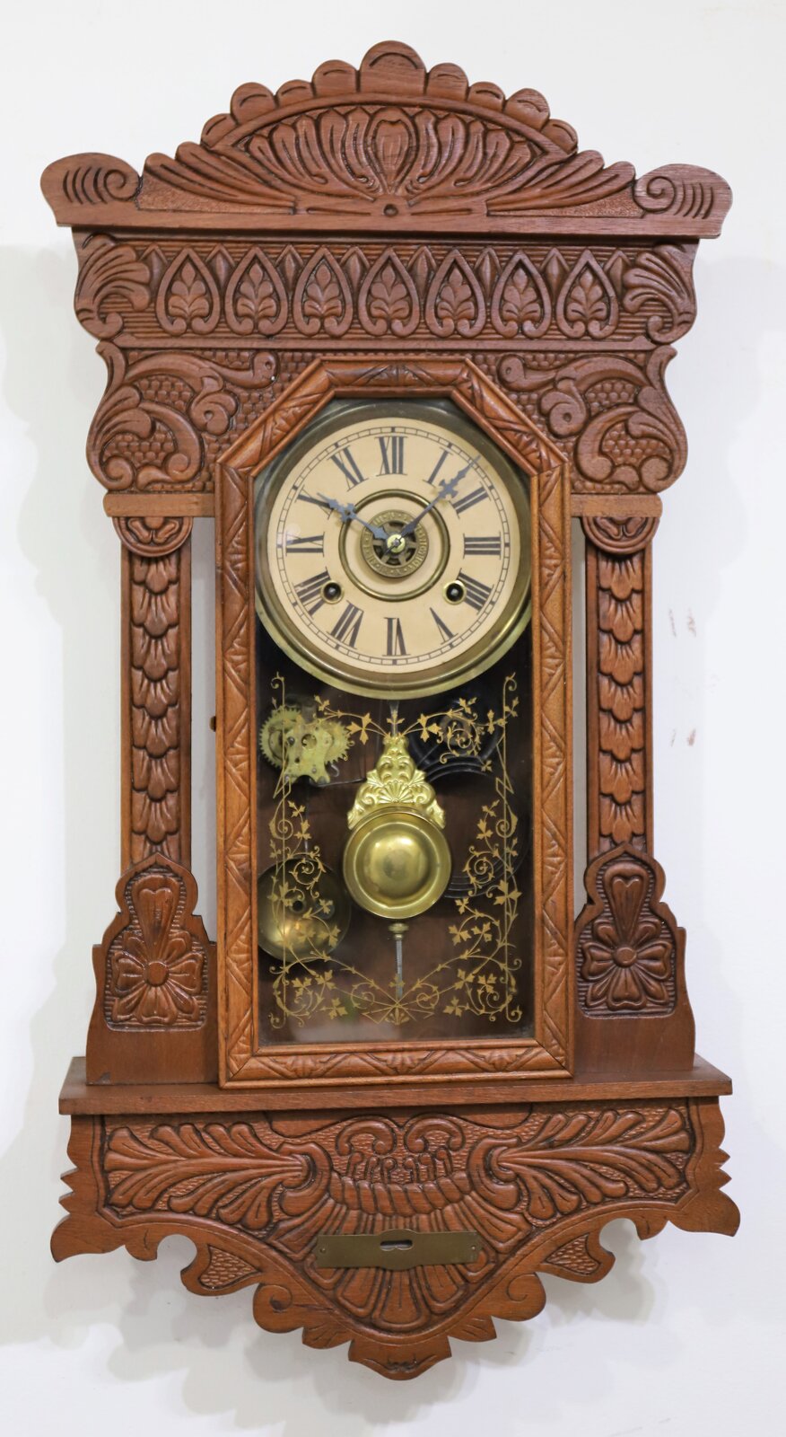 New Haven Clock Co. pressed wood hanging clock, ca. 1915. — Antique Clocks Price Guide
