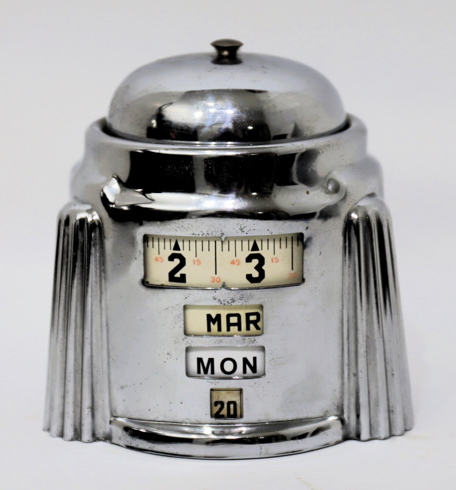 Westclox “Four in One” rotary calendar alarm, ca. 1950. — Antique Clocks Price Guide