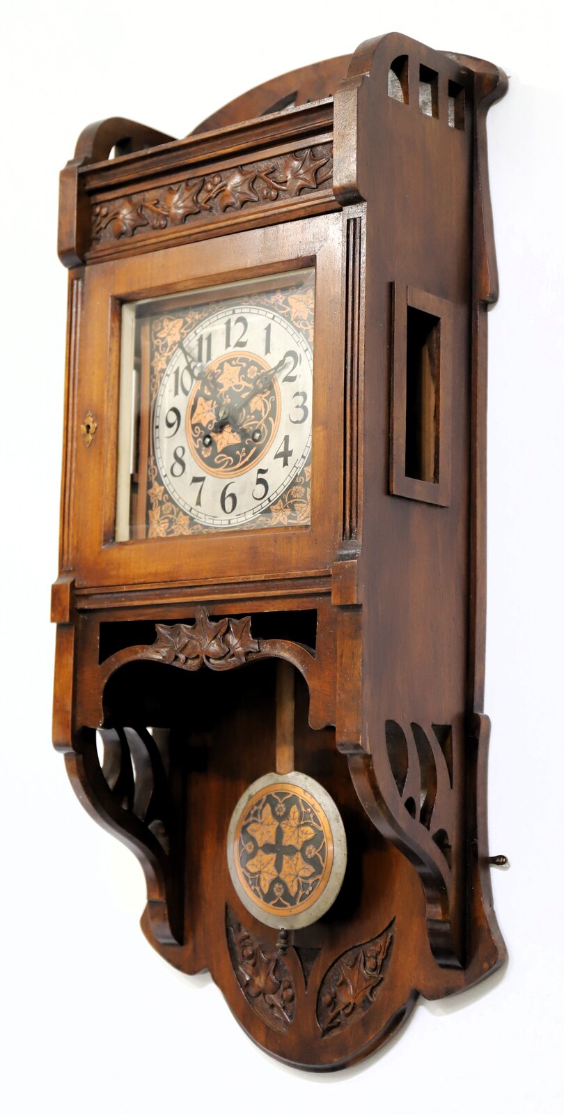 Lauer & Kuhn open well swinger, ca. 1906. — Antique Clocks Price Guide