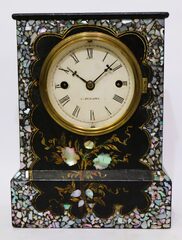 Chauncey Jerome papier mâché MOP cottage with lever-spring movement, 1845-1850.