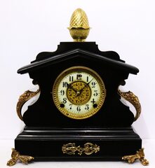 Enameled cast iron mantel clock, ca. 1900.