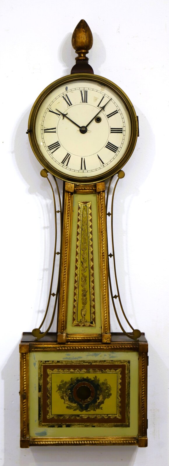 Early gilt-front banjo, ca. 1830. — Antique Clocks Price Guide