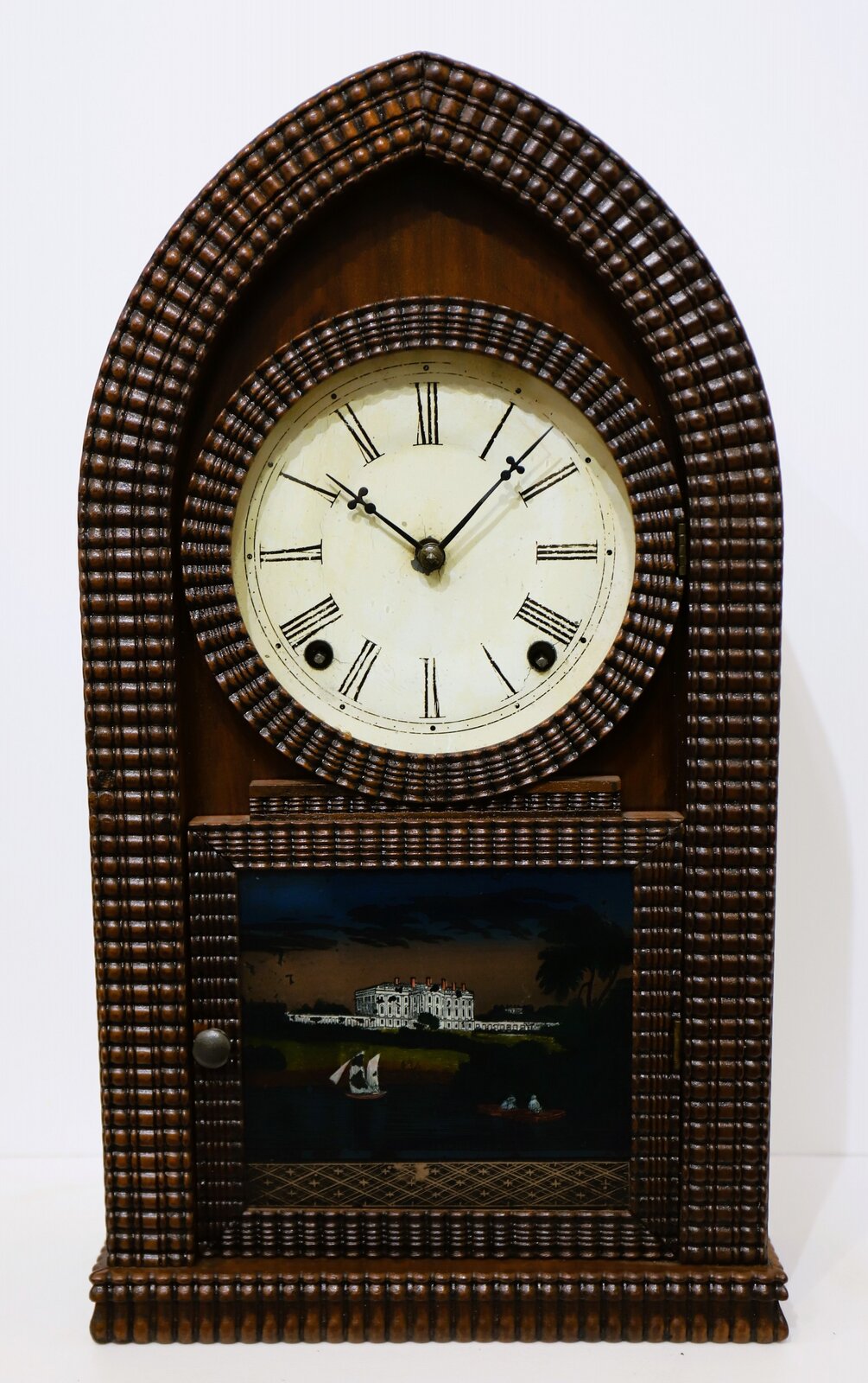 EN Welch Co. ripple-front round gothic, ca. 1860. — Antique Clocks Price Guide