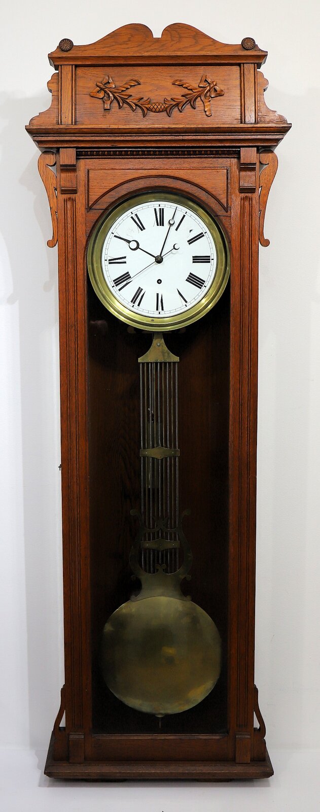 Pinwheel regulator, ca. 1920. — Antique Clocks Price Guide