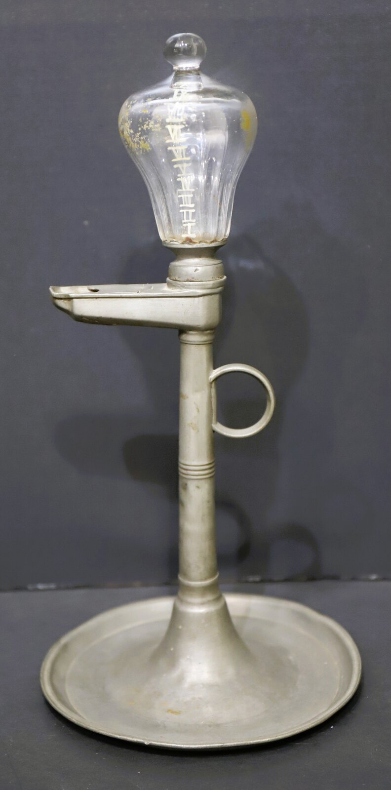 Whale oil lamp-clock, ca. 1750. — Antique Clocks Price Guide