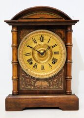 Ansonia Clock Co. small cabinet, ca. 1904.