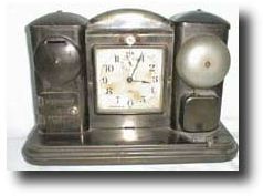 Darche Bank and alarm clock, circa 1910 — Antique Clocks Price Guide