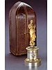 Fine and unusual gilt and silvered bronze, eight-day going keyless small timepiece a cercle tournant, with a small statuette representing Joan of Arc, in original fitted box. Leroy & Cie., 13 et 15, Galerie Montpensier, Paris, circa 1900.