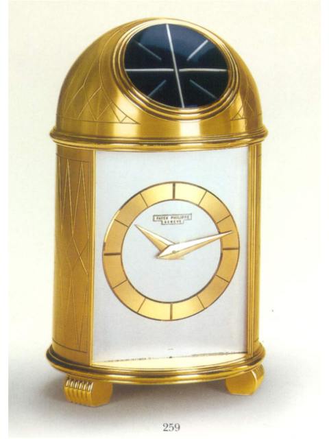 Very fine gilt brass solar-powered table clock based on a mechanical movement. Patek Philippe & Cie. circa 1958. — Antique Clocks Price Guide