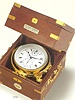 Fine mahogany two-day marine chronometer with winding indicator. Ulysse Nardin, Locle, Suisse, circa 1950.