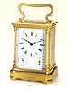 Gilt brass 8 day-going, quadruple-train, grande sonnerie quarter-repeating carriage clock with alarm and date. Unsigned, Wien, circa 1870.